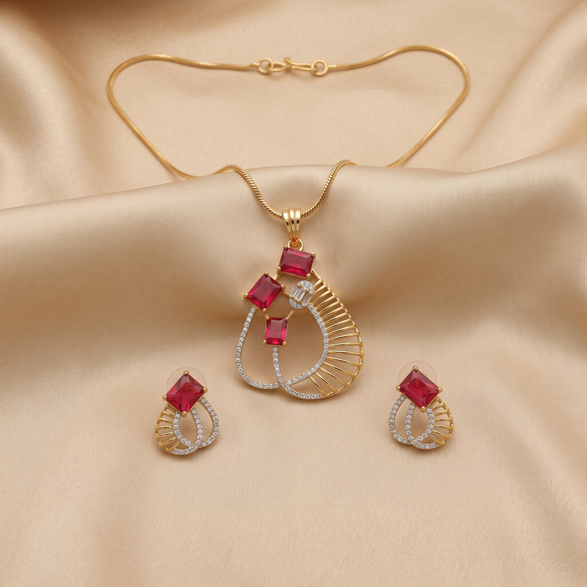 Gold Tone Ruby Red Stone Pendant Set with Earrings for Women Festive Wear